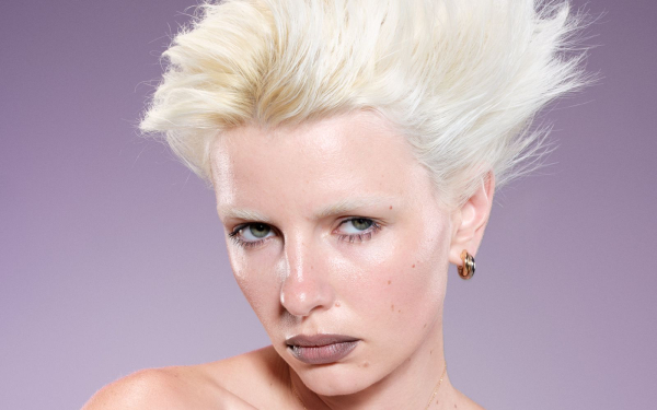 Image may contain Blonde Hair Person Adult Face and Head